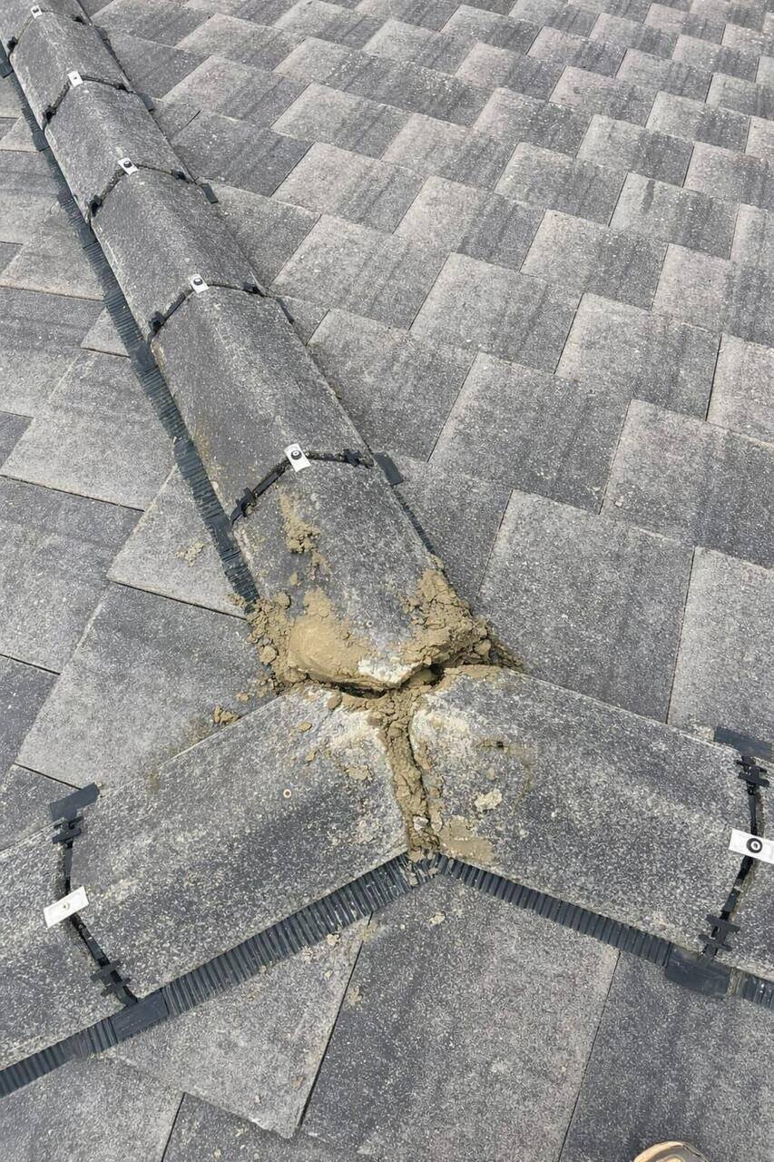 Roof repair specialist at work